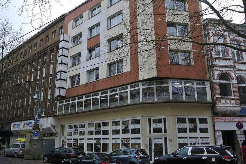 Wohn und Geschäftshaus mit fünf Wohnungen und drei Gewerbeeinheiten im Mülheim-Mitte die Stadt am Fluss
