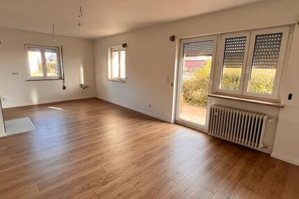 Erdgeschoss-Wohnung mit Terrasse und privatem Garten in ZFH 3 zimmer