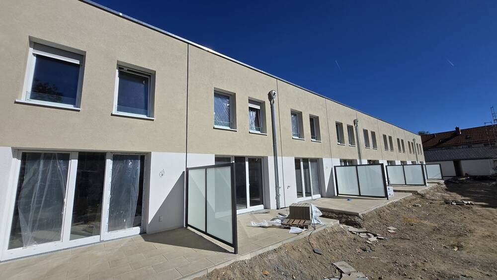 Nachhaltig wohnen, clever sparen: KfW-40-NH Haus mit umweltfreundlicher Pelletheizung 4 zimmer