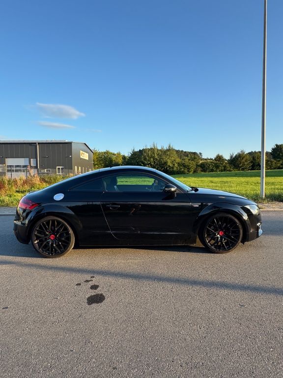 TT