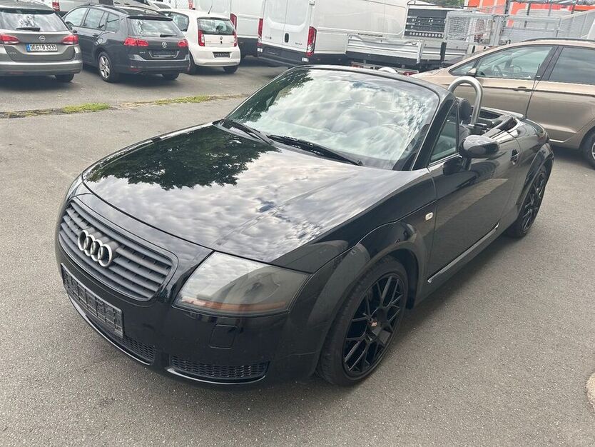 TT
