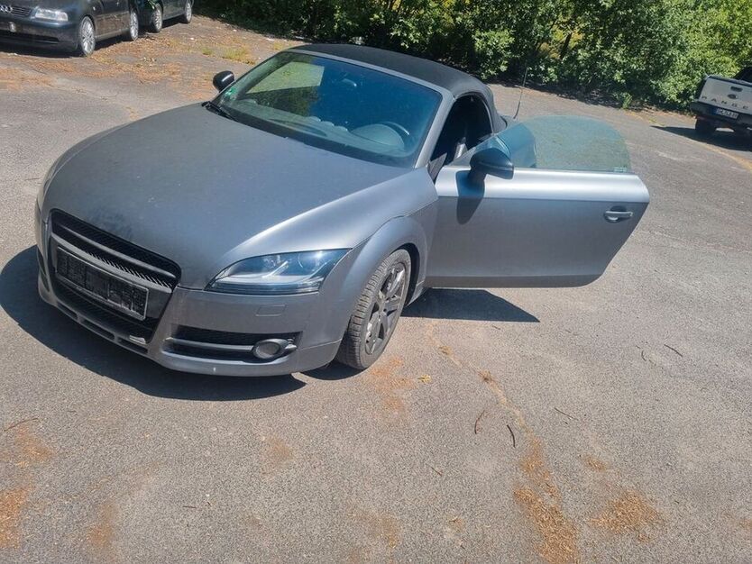 TT