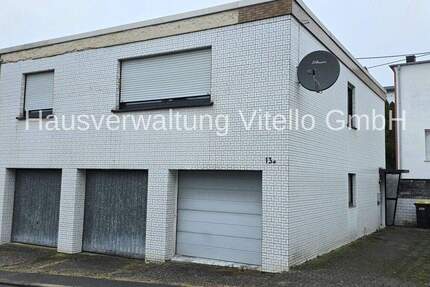 Einfamilienhaus mit 3 Garagen in ruhiger Lage 3 zimmer