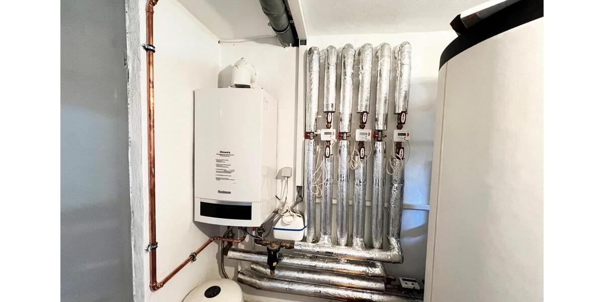 Dreifamilienhaus mit sonnigem Garten 8 zimmer