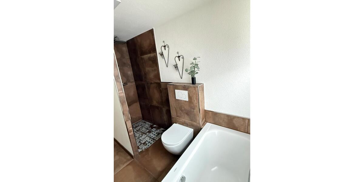 Moderne Eigentumswohnung mit Garage, Garten und Terrasse 3 zimmer