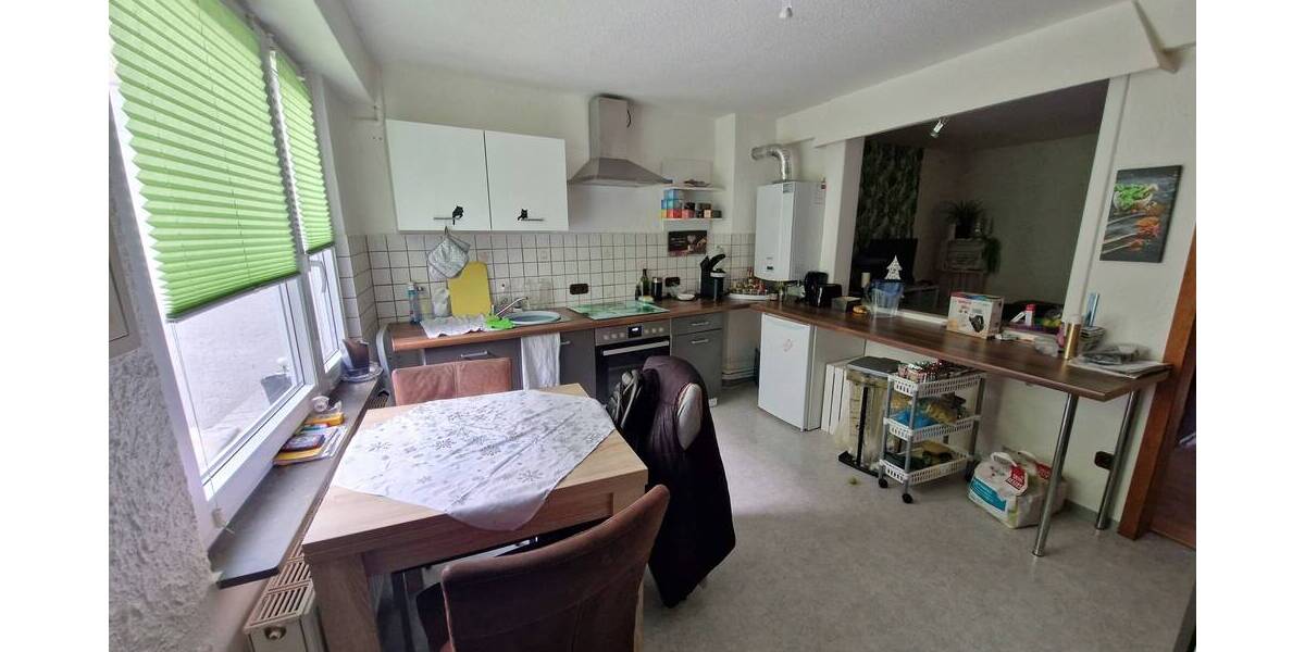 Mehrfamilienhaus mit Ladenlokal, Garagen und Garten zentral in Koblenz-Neuendorf 1 zimmer