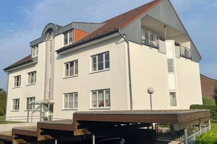 Gemütliche Dachgeschoßwohnung mit Balkon und Carport Stellplatz