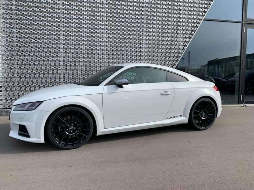 TT