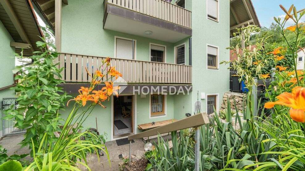 Modernisierte Souterrain-Wohnung mit Terrasse, Garten & Stellplatz in ruhiger Lage