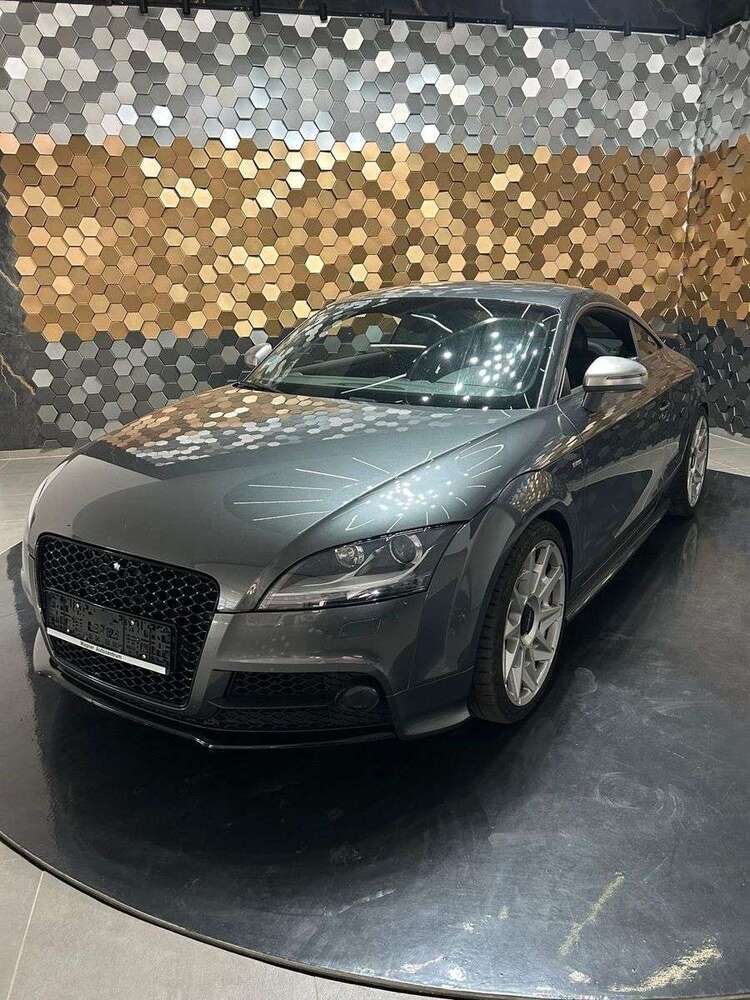 TT