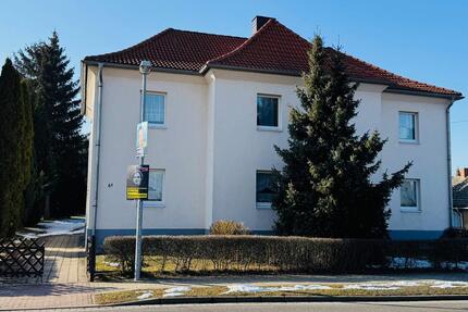 Tolle Investition, vermietetes 4- Familienhaus mit großem Grundst