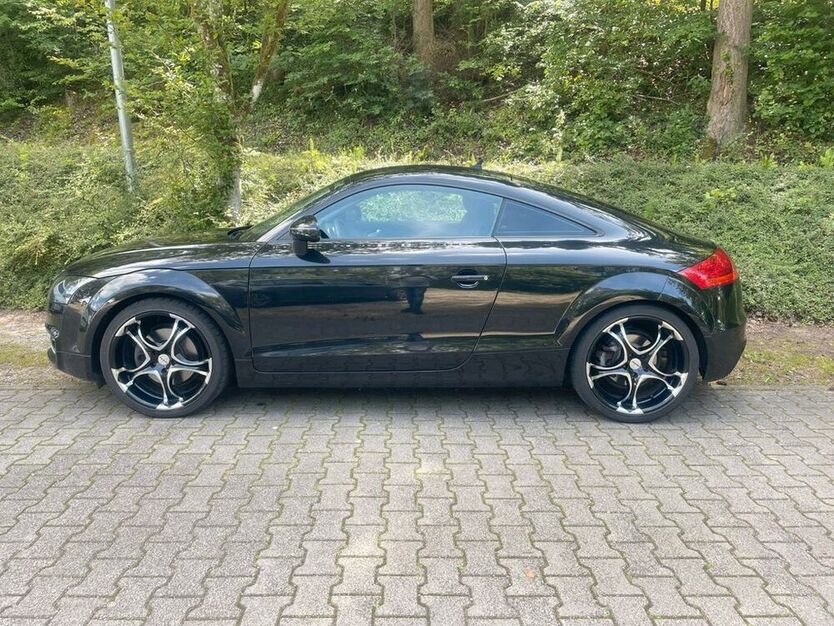 TT