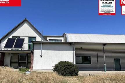 Gewerbeobjekt mit Wohn- u. Bürogebäude sowie zwei Lagerhallen zimmer