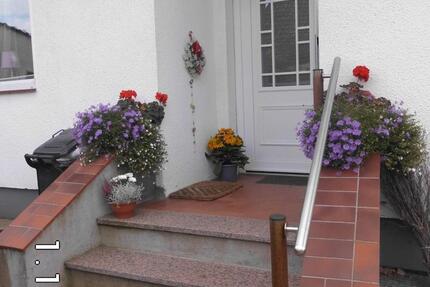 Vermietung eines Hauses mit Garten