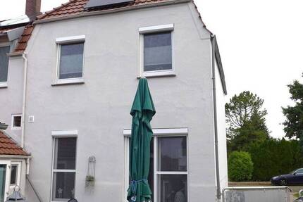 Modernisierte Doppelhaushälfte mit Garage, Innenhof und Garten 4 zimmer