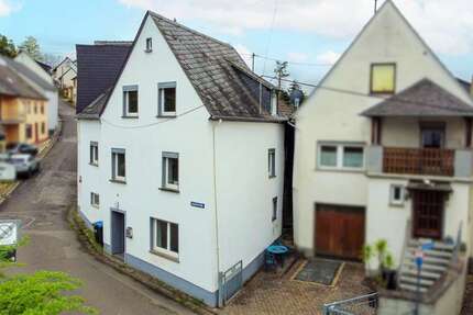 Haus zum Kaufen in Neumagen-Dhron 99.000 € 87.08 m² 4 zimmer