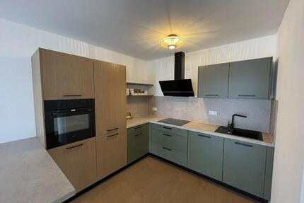 2 Zimmer-Terrassenwohnung im EG mit Grünfläche
