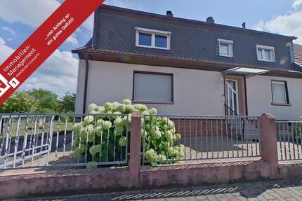 Eine Vielzahl an Nutzungsmöglichkeiten - 1-2-Familienhaus mit Baugrundstück in zweiter Reihe 6 zimmer