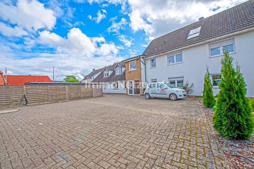 Moderne 3-Zimmer-Erdgeschosswohnung mit Einbauküche und Garten in Syke-Barrien zimmer