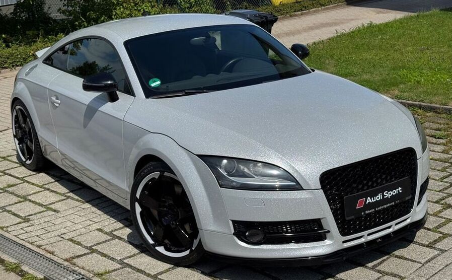 TT