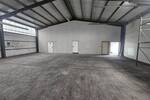 Pfeilerfreie Lagerhalle mit 2 Rolltoren, Büro, Lager, Teeküche, WC & zusätzl. Freifläche zimmer