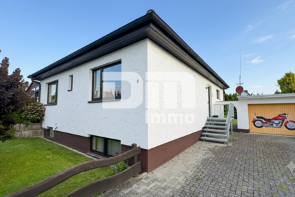 Solider Familien-Bungalow mit großem Potenzial in ruhiger Lage mit Wintergarten und Garage - Haus Calden | Angebot:26974963