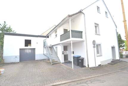 Zweiparteienhaus mit Garage, Garten und guter Anbindung nach Trier & Luxemburg 5 zimmer