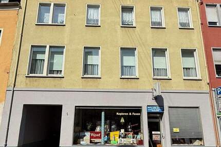 Solides Mehrfamilienhaus mit 4 Einheiten in zentraler Lage zimmer