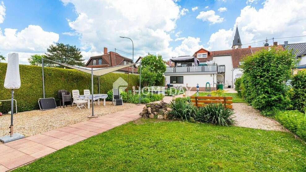 Exklusives Wohnen: Ihr neues Zuhause mit beeindruckender Dachterrasse und Gartenparadies
