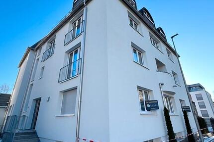 Helle 3-Zimmer-Neubauwohnung mit Terrasse, moderner Einbauküche & Pkw-Stellplatz 3 zimmer