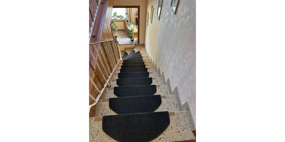 Interessantes Wohnhaus mit 2 Wohnungen, Nebengebäude und Grünland - Einfamilienhaus Stolzenau | Angebot:26701576