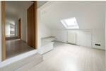 Außergewöhnliche 4,5 Zimmer Wohnung direkt am Feld mit Garage