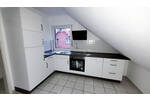 Moderne helle 3-Zimmer-Dachgeschoßwohnung mit Balkon, Garage und Einbauküche