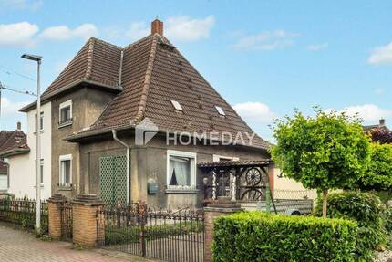 Gemütliche Doppelhaushälfte mit Charme, Gartenidylle und Potenzial