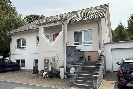 Schmitten: Leben im Grünen im Niedrigenergiehaus! EFH mit 100m² großer ELW in Top-Waldrandlage 9 zimmer