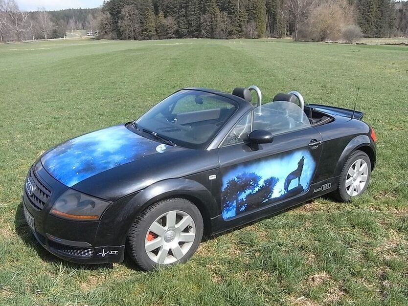TT