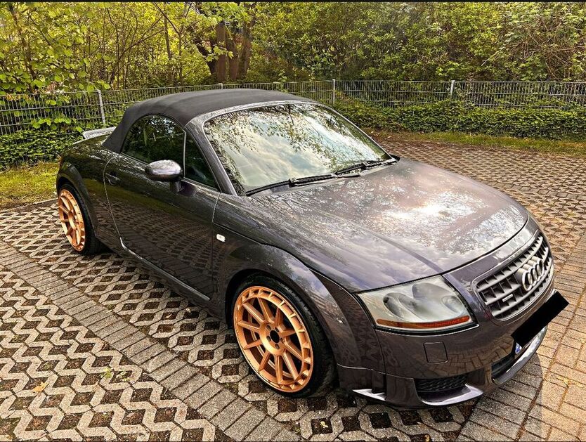 TT