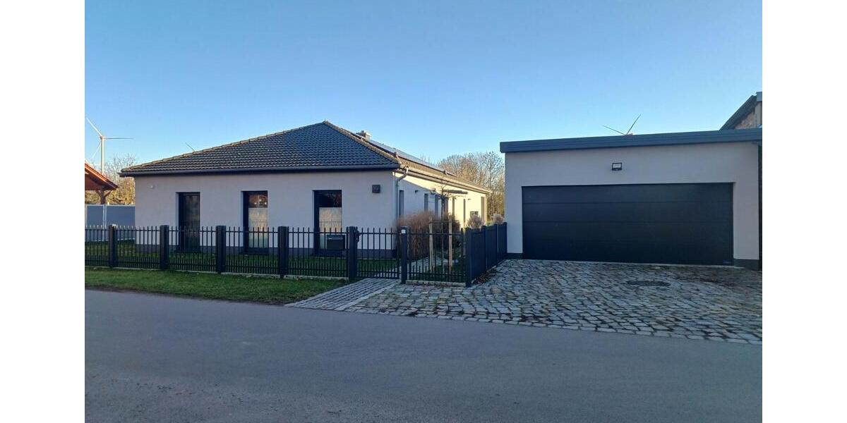 Exklusives Einfamilienhaus mit parkähnlicher Gartenanlage 4.5 zimmer