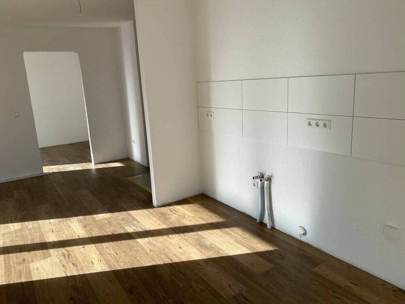 Barrierearme, freundliche 2-Zimmer-Wohnung mit Tiefgaragenstellplatz