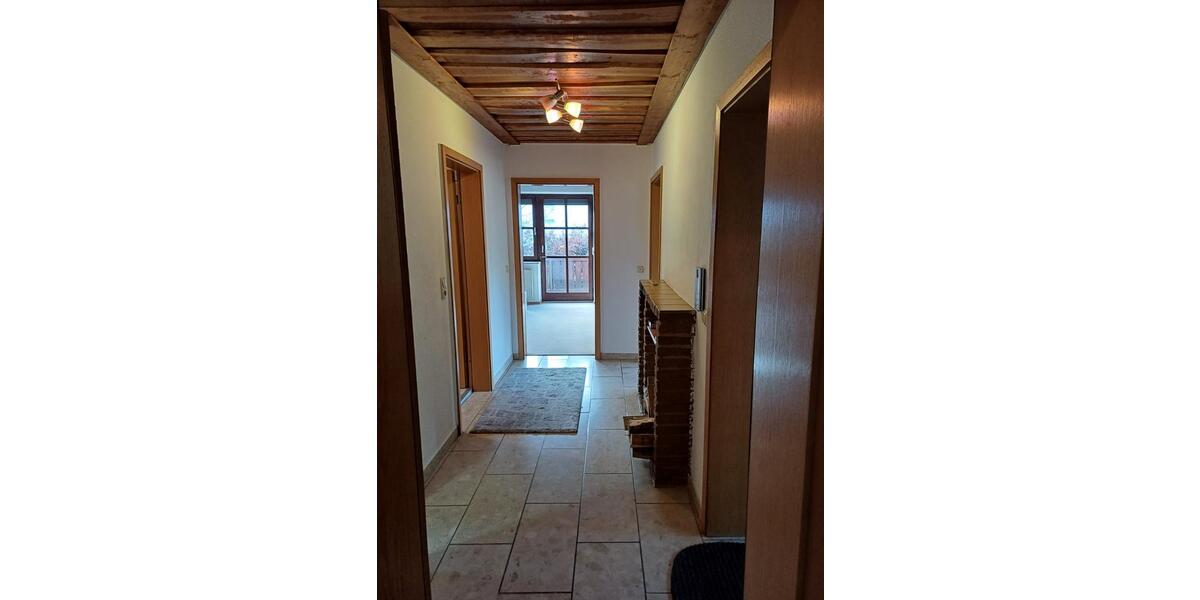 2 Zimmerwohnung in Bodenmais - Balkon, Einbauküche, Kachelofen zimmer