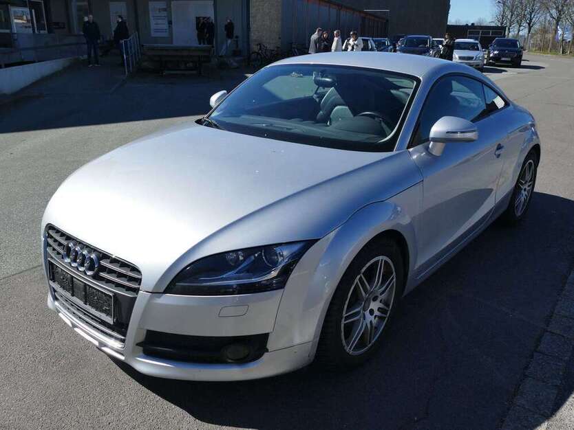 TT