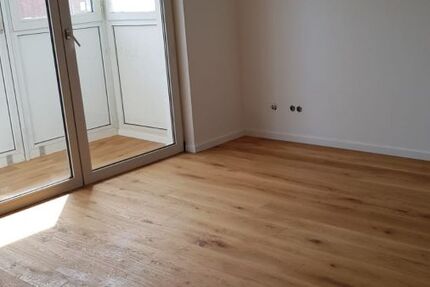 2-Zimmer-Wohnung (mit Wintergarten und Tiefgaragenstellplatz)
