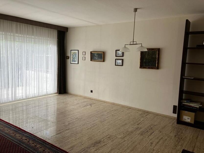 Zentral gelegenes Einfamilienhaus mit kleinem Garten zimmer