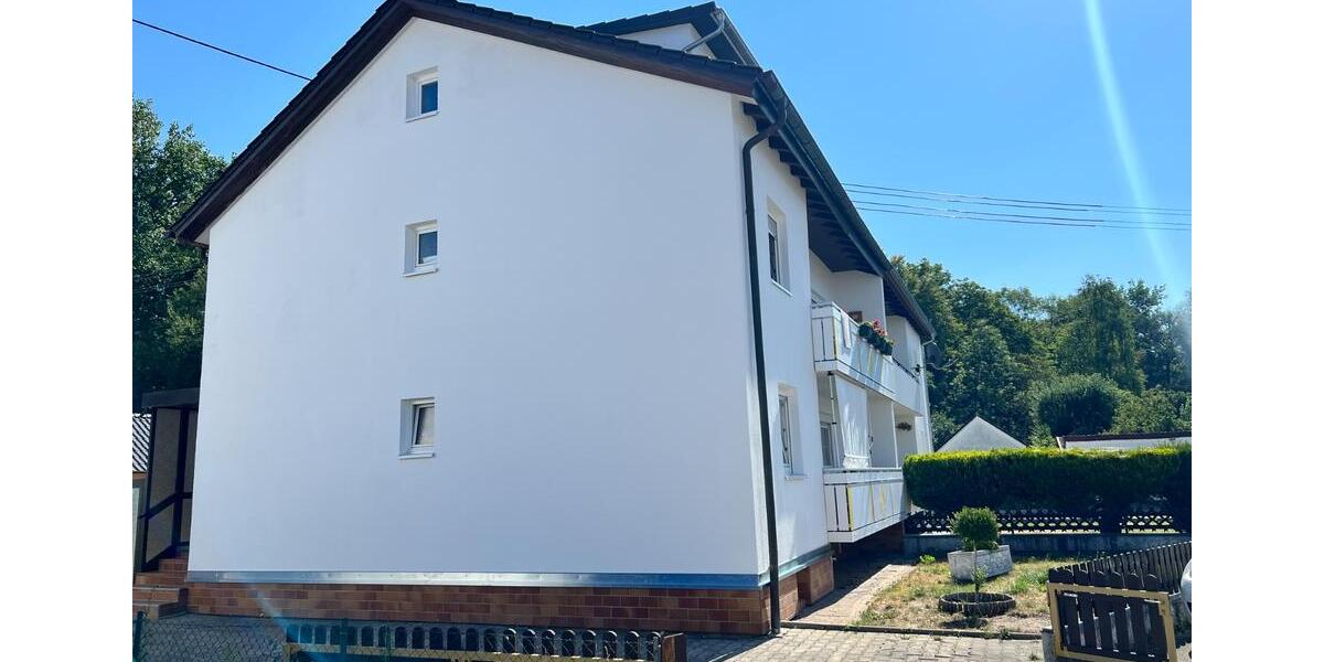 Dreifamilienhaus mit sonnigem Garten 8 zimmer