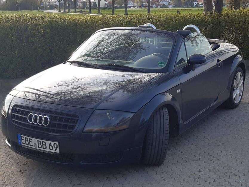 TT