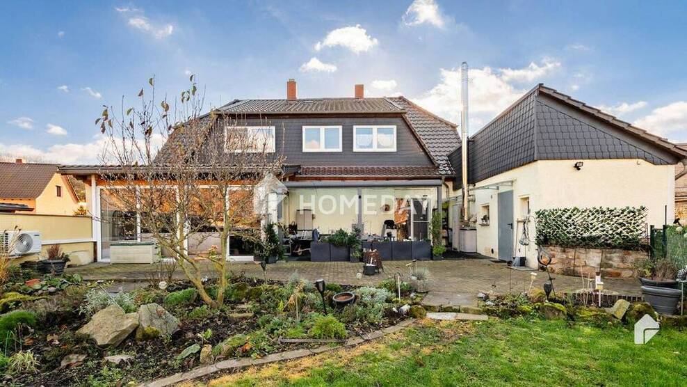 Idyllisches EFH mit EinliegerWohnung, großem Grundstück, Terrasse und 4 Garagen in Milzau