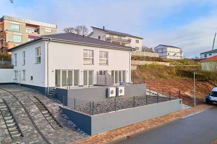 Haus zum Kaufen in Thaleischweiler-Fröschen 455.000 € 171 m² 5 zimmer