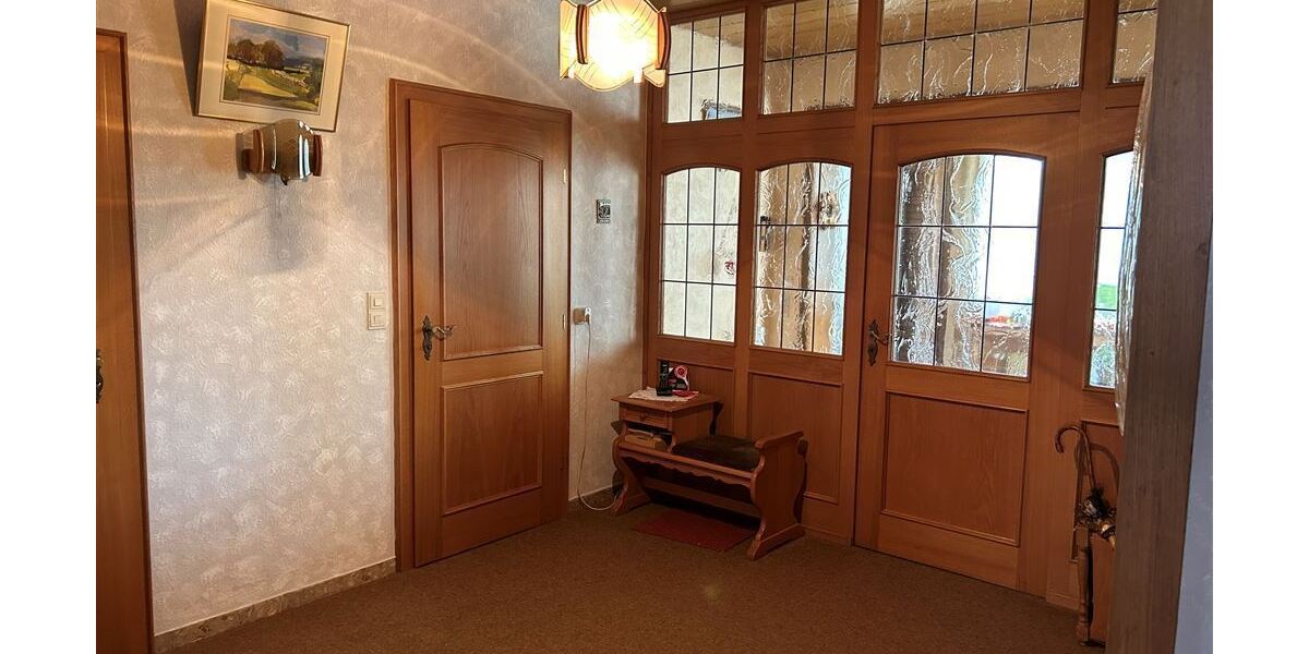 Interessantes Wohnhaus mit 2 Wohnungen, Nebengebäude und Grünland - Einfamilienhaus Stolzenau | Angebot:27142431