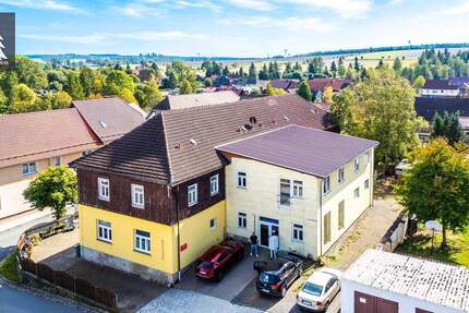 Ehemaliges Schulgebäude mit Geschichte - zehn barrierefreie Wohnungen und attraktivem Entwicklungspotenzial zimmer