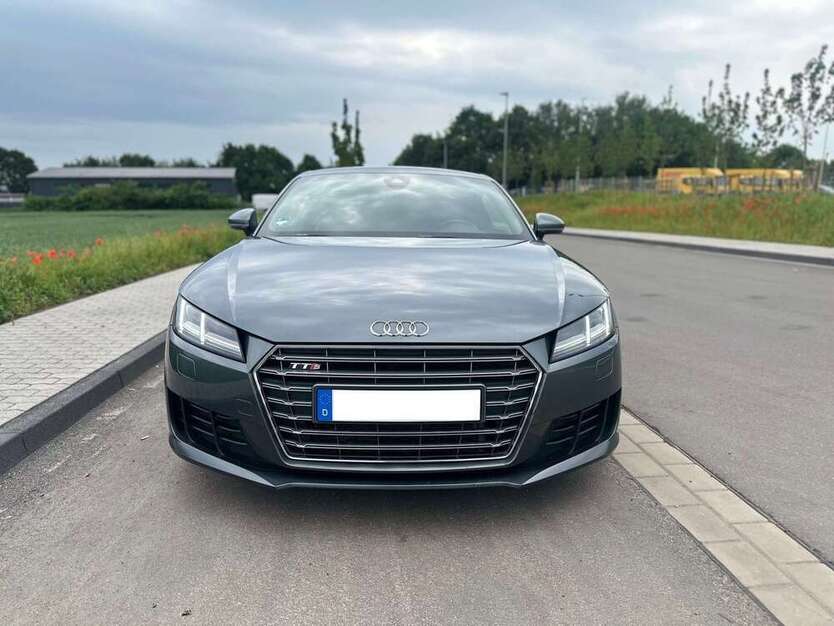 TT